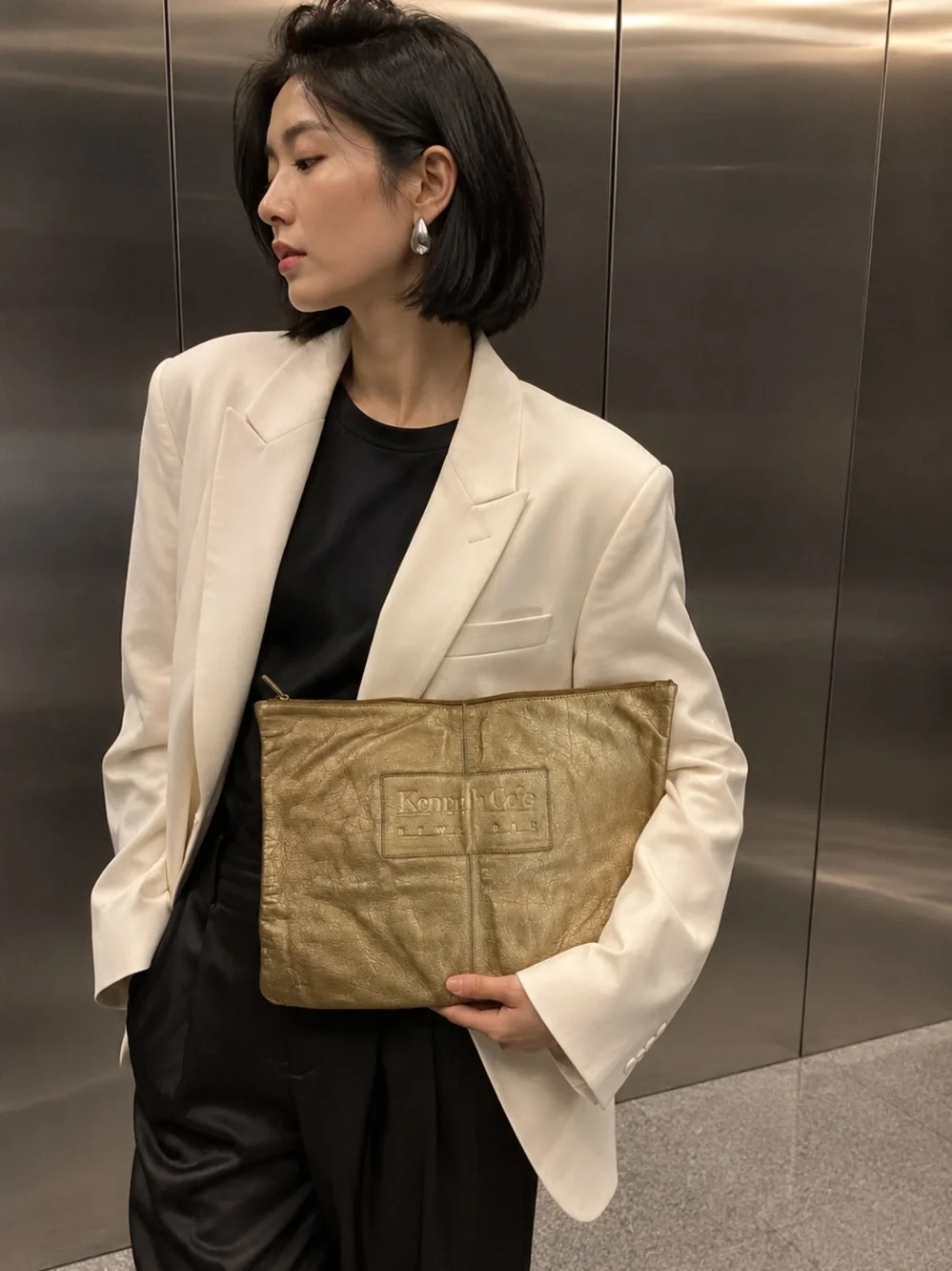 Kenneth Cole Gold Leather clutch bag